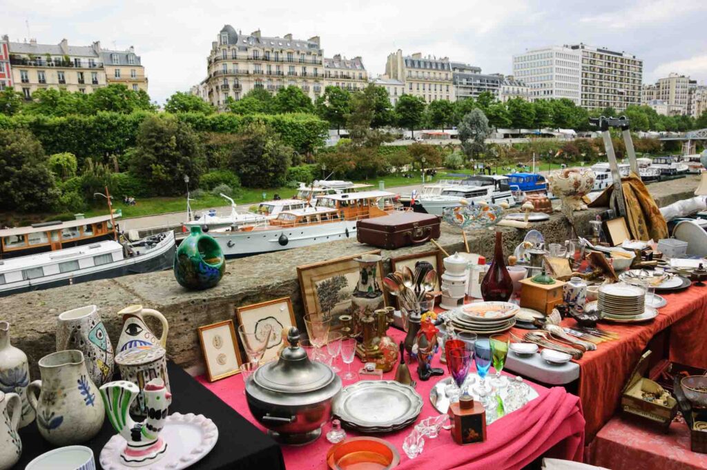 Flea market at embankment of Bassin de l'Arsenal near Place de la Bastille