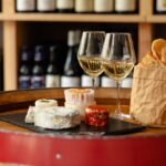 Two glasses of expensive French white wine served in Parisian bar