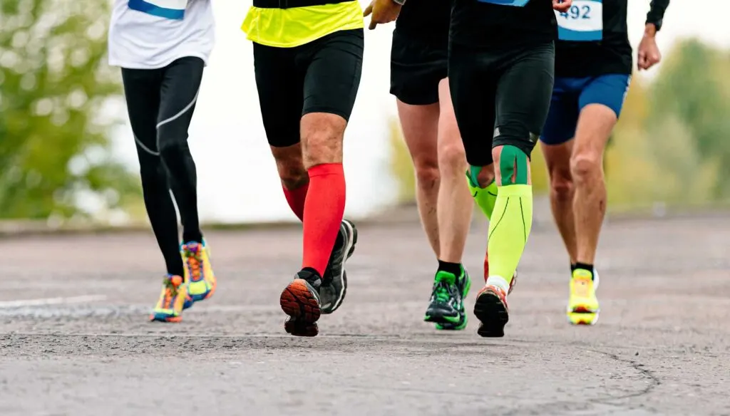 Legs of runners on a marathon