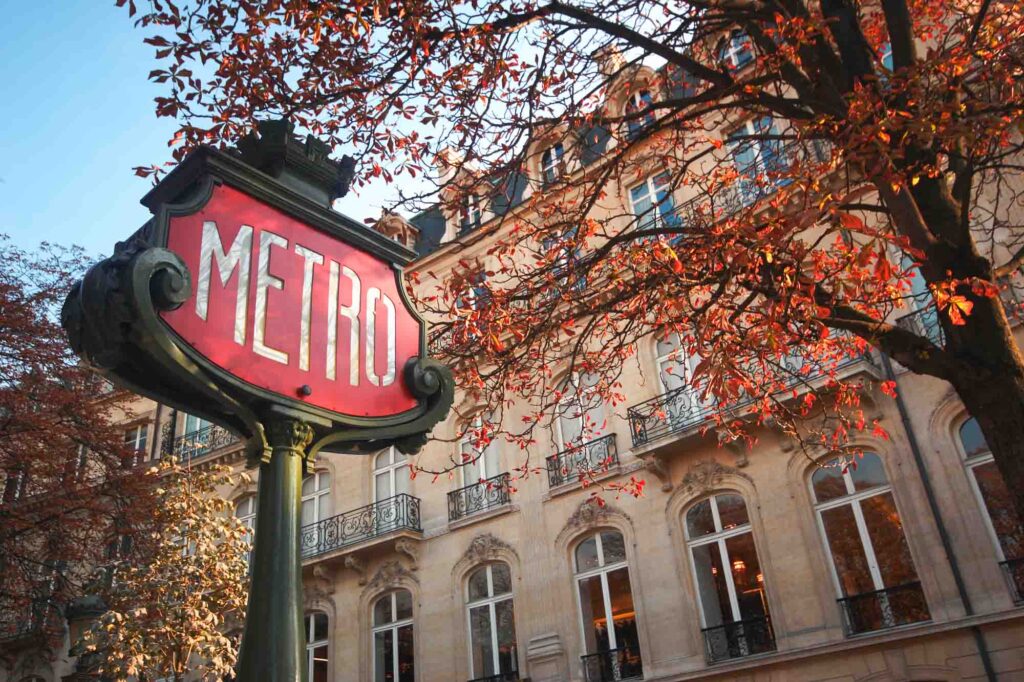 Metro sign in Paris during fall
