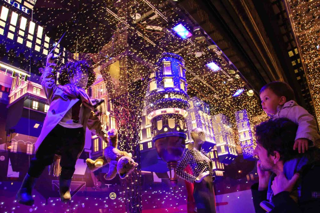 Colorful Christmas decoration by Burberry in the windows of Printemps department store