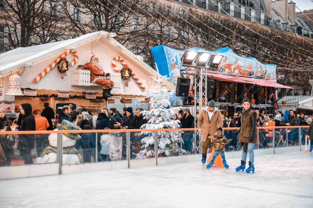 Ice rink in Christmas market in Tuileries Gardens