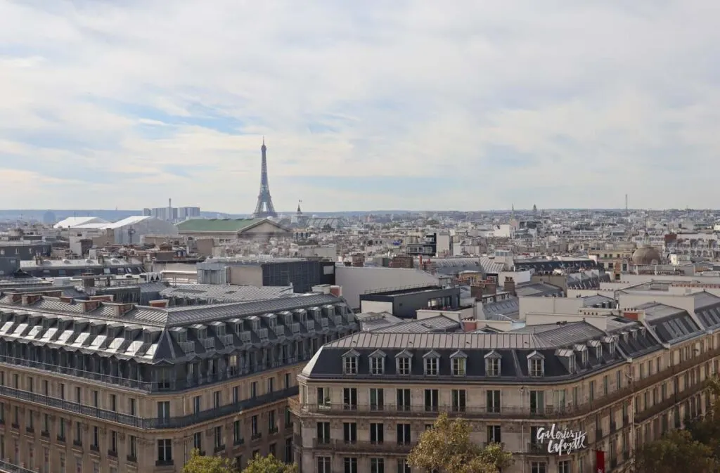 Eiffel Tower from a distance as seen from Galeries Lafayette Haussmann in Paris