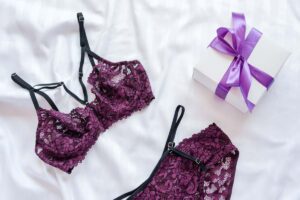 French lingerie brand displaying product on bed
