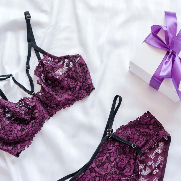 French lingerie brand displaying product on bed