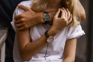 Close-up of couple hands wearing French watches