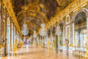 The extravagant Hall of Mirrors in the Royal Palace of Versailles
